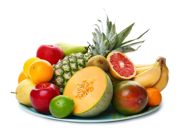 Plate with fresh tropical fruits on white background — Stock Photo, Image