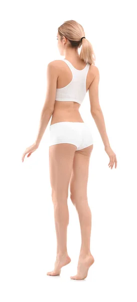 Mujer joven con hermoso cuerpo delgado sobre fondo blanco —  Fotos de Stock