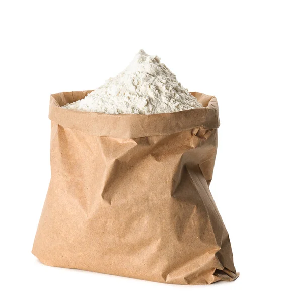 Paper bag with flour on white background — Stock Photo, Image