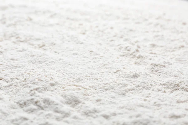 Bílé pšeničné mouky jako pozadí — Stock fotografie