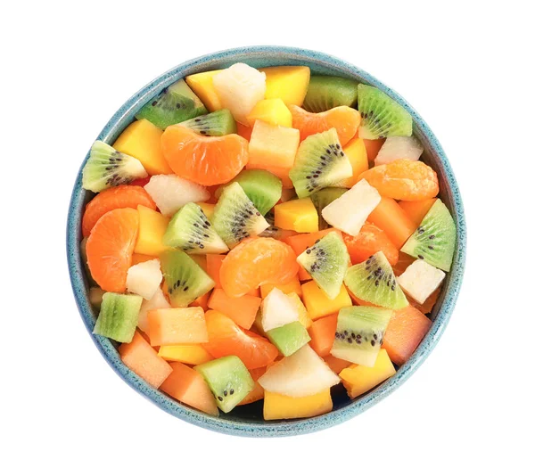 Tigela com frutas frescas cortadas no fundo branco — Fotografia de Stock