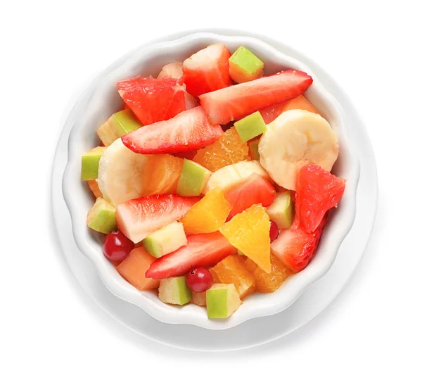 Cuenco con frutas frescas cortadas sobre fondo blanco — Foto de Stock