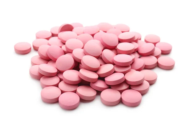 Pink pills on white background — Stock Photo, Image