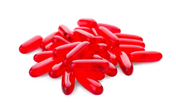 Διαφανές κόκκινο χάπια σε λευκό φόντο — Φωτογραφία Αρχείου