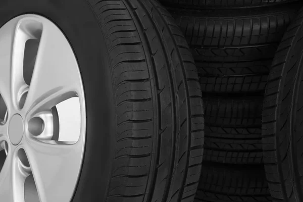 Car tire on white background — Stock Photo, Image