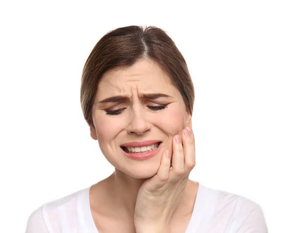 Jovem que sofre de dor de dente no fundo branco — Fotografia de Stock