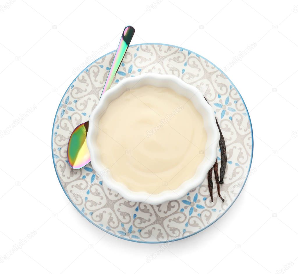 Vanilla pudding and sticks on white background