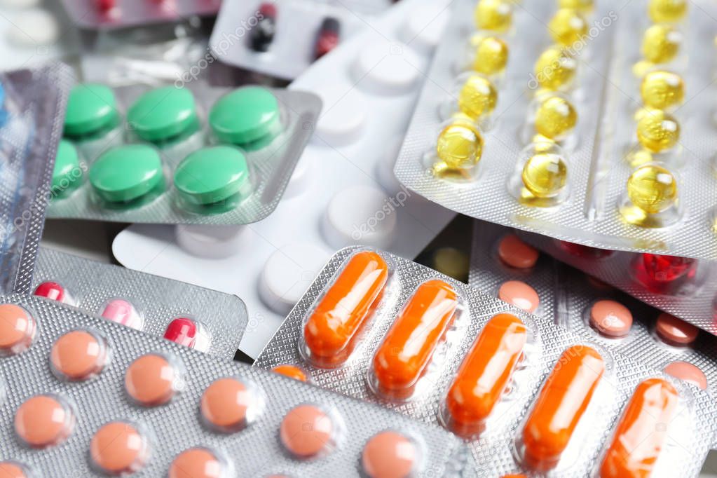 Blister packs with pills and capsules, closeup