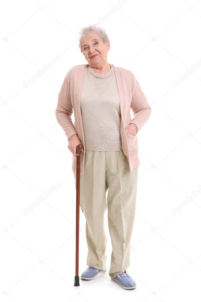 Elderly woman with cane on white background