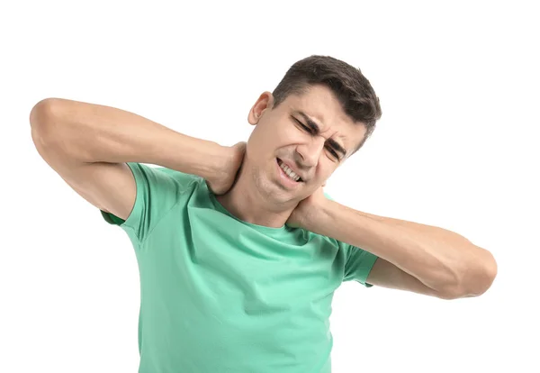 Fiatal férfi szenved a nyaki fájdalom fehér háttér — Stock Fotó