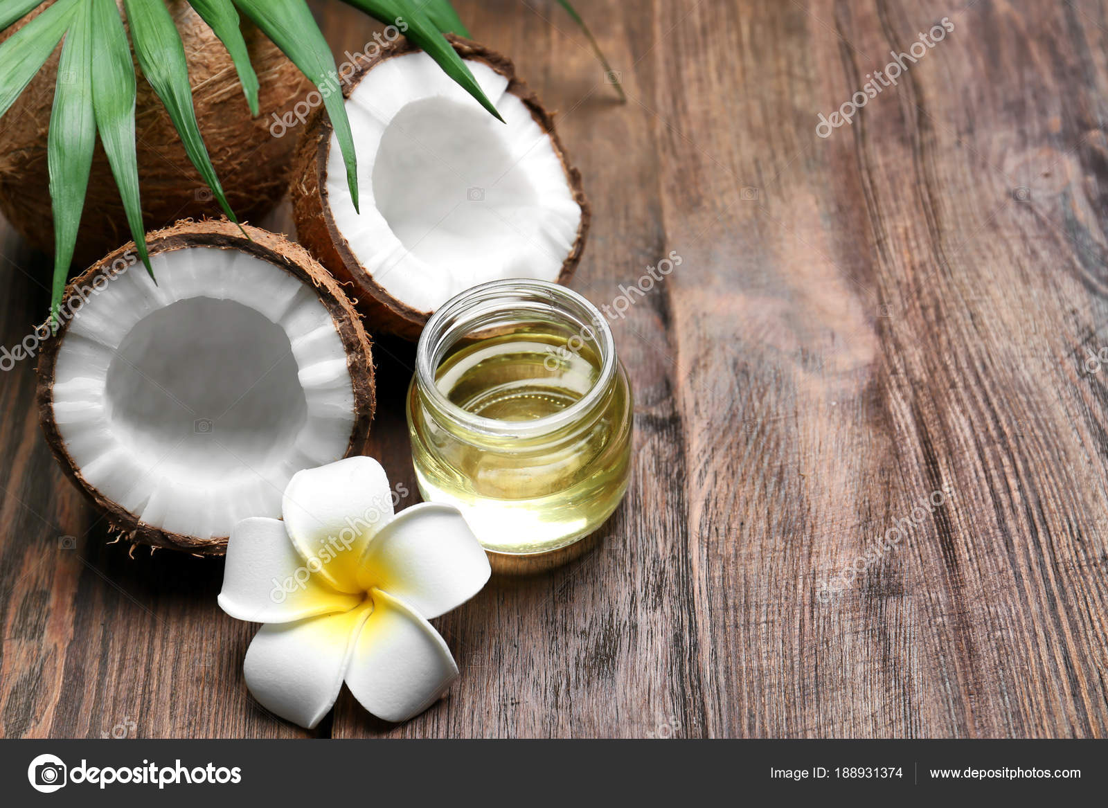 Beautiful Composition With Coconut Oil And Nuts On Wooden