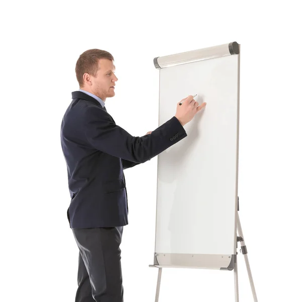 Бізнес-тренер показує презентацію на дошці фліп-чартів на білому тлі — стокове фото