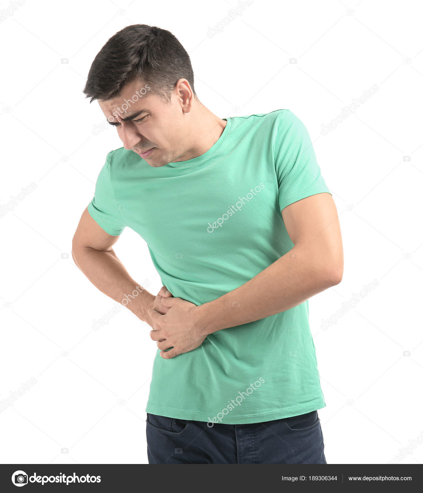 Man suffering from flank pain on white background Stock Photo - Alamy