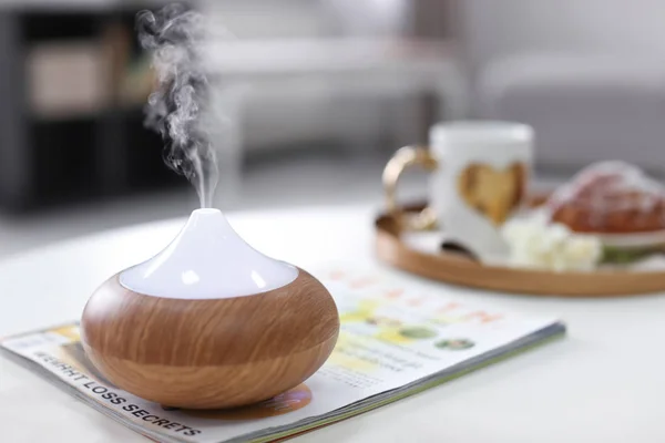 Humidifier on table at home — Stock Photo, Image