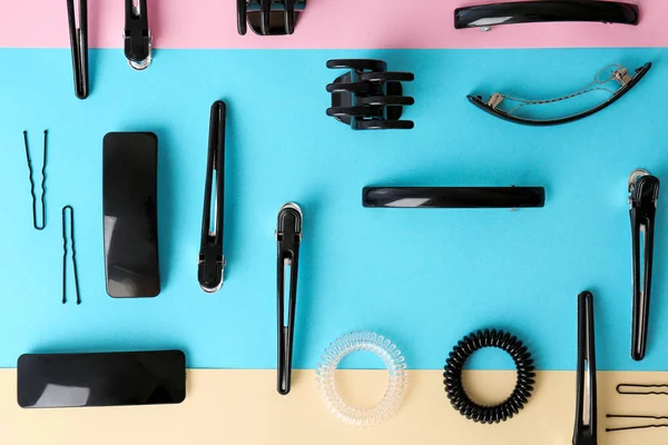 Flat lay composition with professional hairdresser tools on color background — Stock Photo, Image