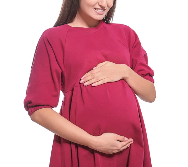 Unga gravid kvinna i casual kläder på vit bakgrund — Stockfoto