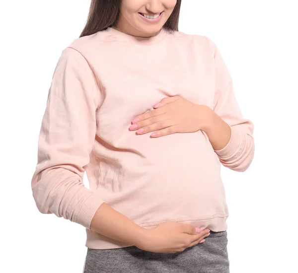 Fiatal terhes nő alkalmi ruhák, a fehér háttér — Stock Fotó