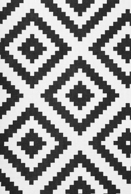 Arka plan olarak siyah ve beyaz halı