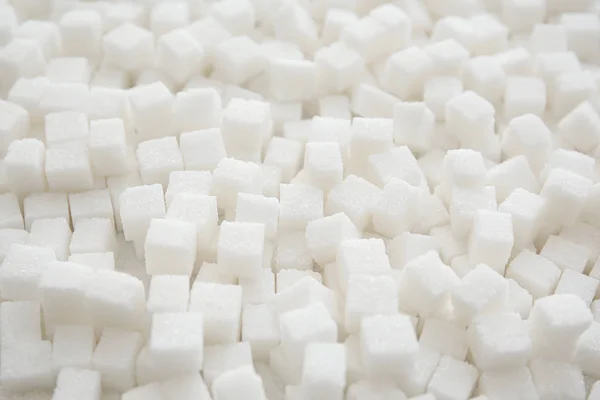 Cubos de azúcar refinados como fondo — Foto de Stock