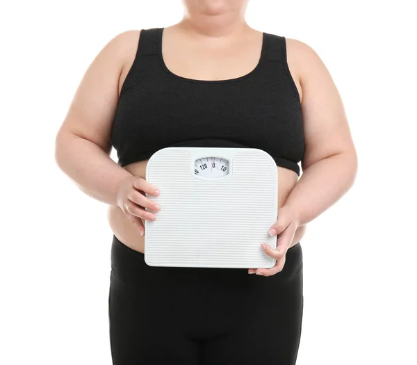 Vrouw met overgewicht met schubben op witte achtergrond — Stockfoto