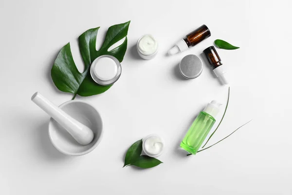 Flat lay composition with cosmetic products on white background — Stock Photo, Image