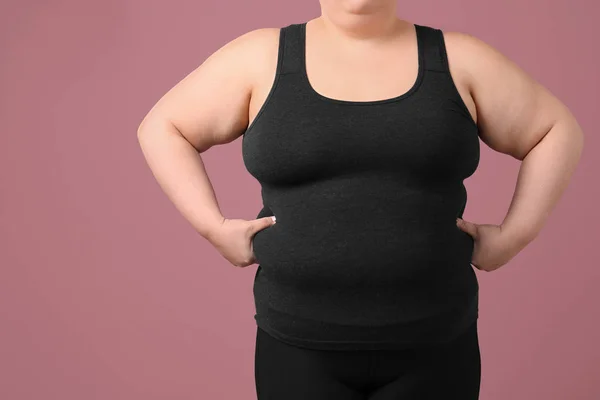 Overweight woman on color background — Stock Photo, Image