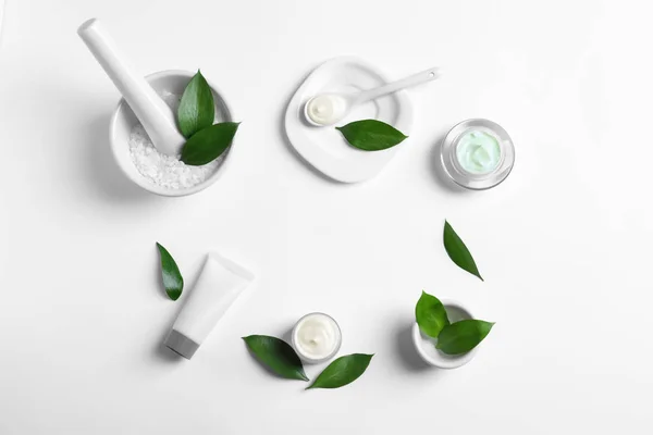 Flat lay composition with cosmetic products on white background — Stock Photo, Image