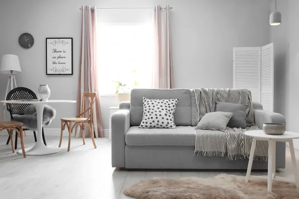 Stylish living room interior with comfortable couch — Stock Photo, Image