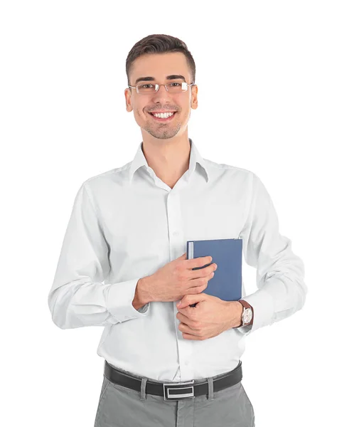 Jeune professeur masculin avec livre sur fond blanc — Photo