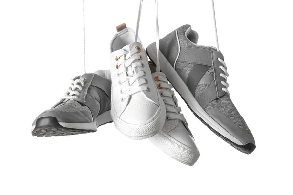 Verschiedene Schuhe auf weißem Hintergrund — Stockfoto