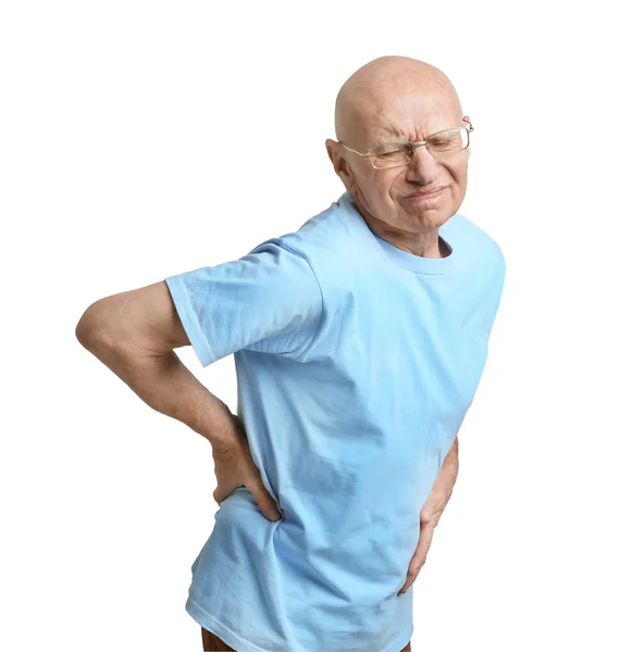 Man suffering from back pain on white background — Stock Photo, Image