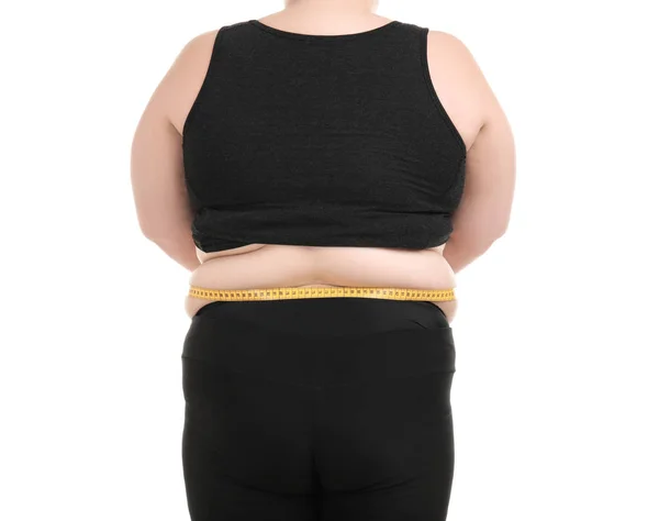 Overweight woman with measuring tape on white background — Stock Photo, Image