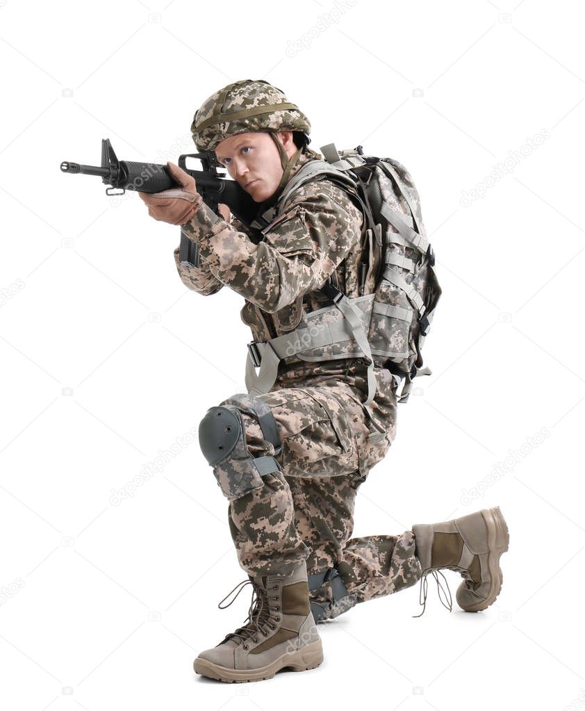 Male soldier with machine gun on white background. Military service
