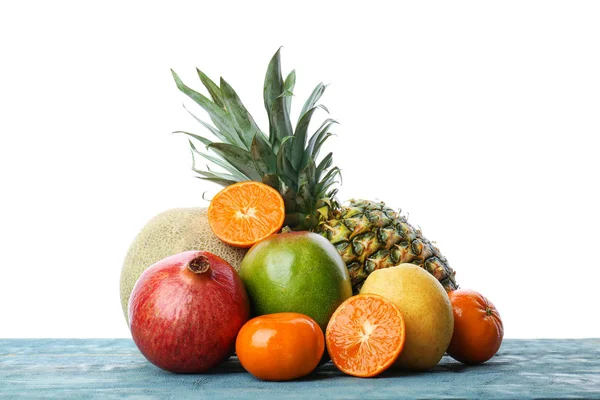 Set of fresh tropical fruits on wooden table — Stock Photo, Image
