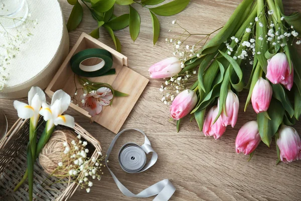 Decorator's workplace with beautiful flowers, top view — Stock Photo, Image