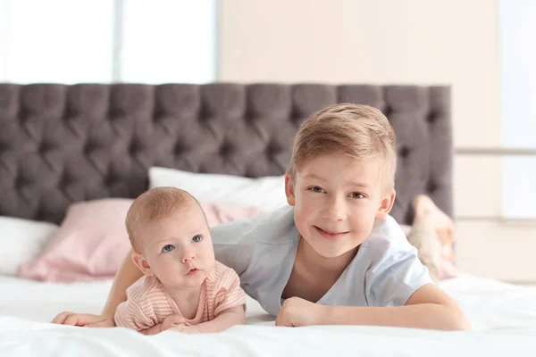 Cute Little Baby Elder Brother Lying Bed Home — Stock Photo, Image