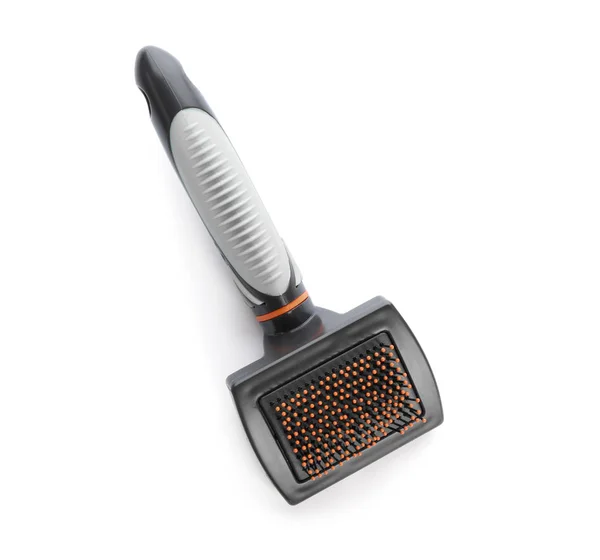 Brosse pour chat sur fond blanc, vue de dessus. Soins des animaux — Photo