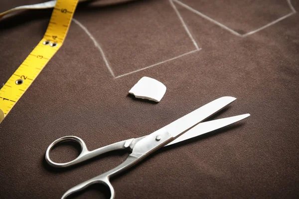 Tailoring tools on fabric with pattern template — Stock Photo, Image