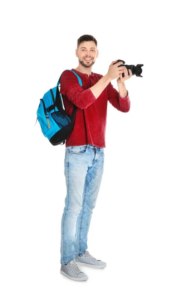 Fotografo maschio con fotocamera su sfondo bianco — Foto Stock