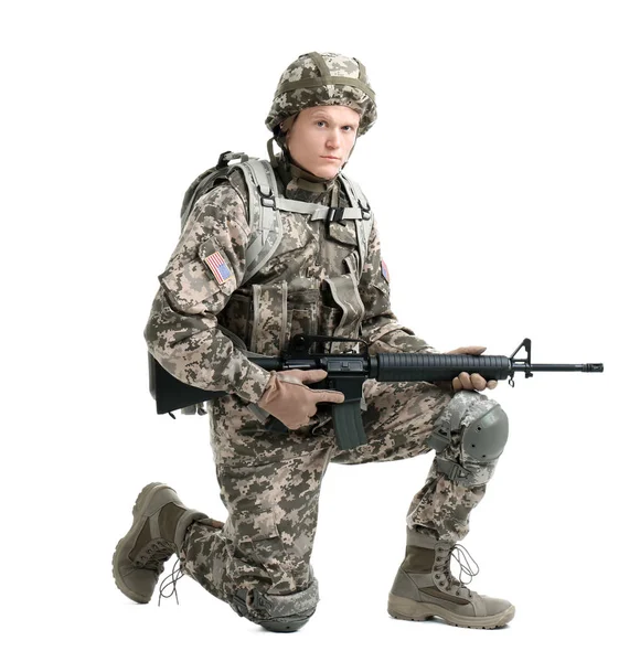 Soldado masculino com metralhadora em fundo branco. Serviço militar — Fotografia de Stock