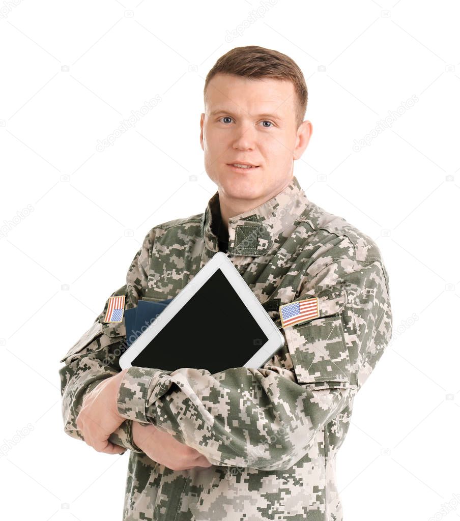 Male soldier with books and tablet computer on white background. Military service