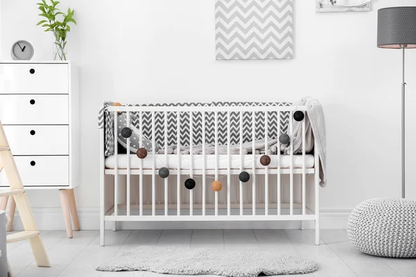 Baby room interior with comfortable crib — Stock Photo, Image