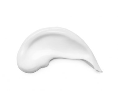 Beyaz arka plan üzerinde krem karalama. Kozmetik ürün