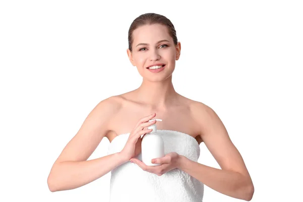 Young woman with bottle of hand cream on white background — Stock Photo, Image