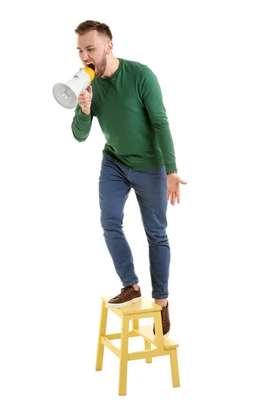 Jovem gritando em megafone sobre fundo branco — Fotografia de Stock