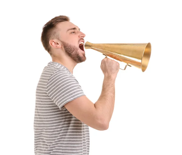 Young man shouting into megaphone on white background — Stock Photo, Image