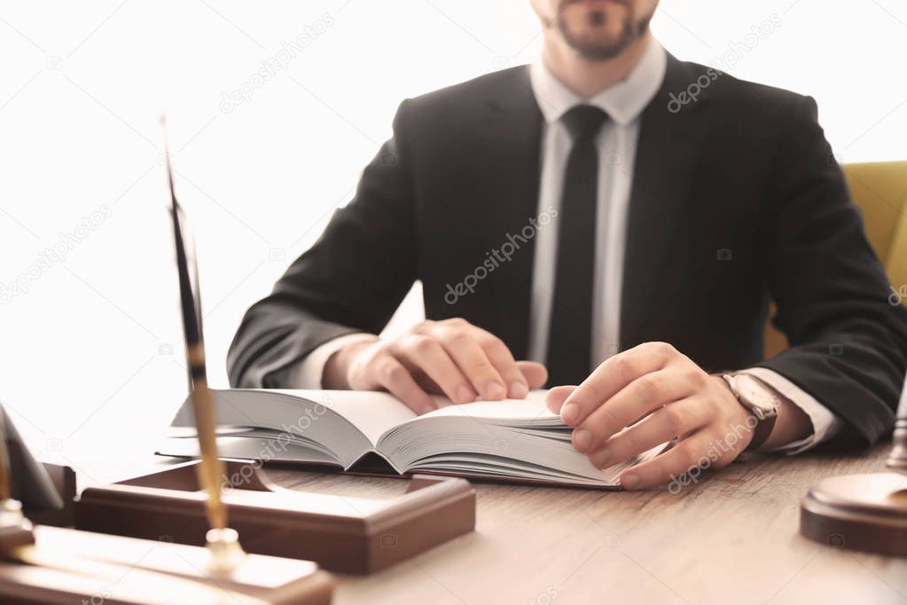 Male lawyer working in office
