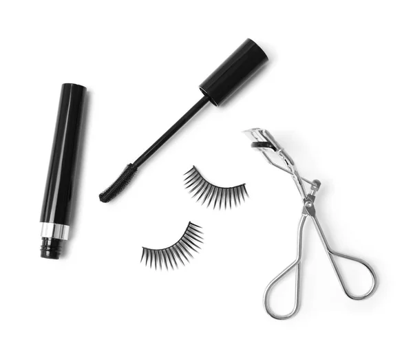 False eyelashes, mascara and curler on white background — Stock Photo, Image