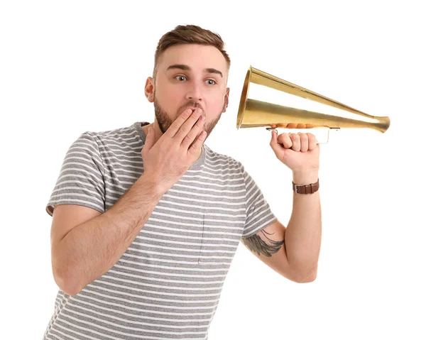 Young man with megaphone on white background — Stock Photo, Image