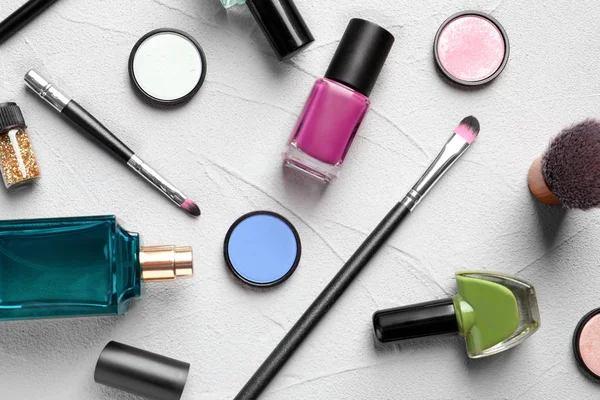 Flat lay composition with decorative cosmetics on gray background — Stock Photo, Image